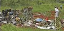  ?? - Reuters ?? WRECKAGE: A rescue team member works at the wreckage of a Boeing 737 plane that crashed in the agricultur­al area of Boyeros, around 20km (12 miles) south of Havana, shortly after taking off from Havana’s main airport in Cuba, on May 18, 2018.