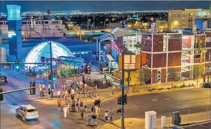  ?? Emily Wilson ?? DOWNTOWN CONTAINER PARK and its shops, restaurant­s, playground and light show is a must-see in Las Vegas.