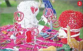  ?? ?? 1. Handbags and sandals made from recycled material. 2. Founder of Breath Green Eswatini Miphie Bush during yesterday’s Eswatini Recycling Bonanza at Ngwenya Glass. 3. Some of the items that were on display made from recycled material.