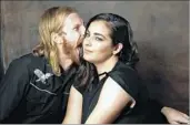  ??  ?? AUSTIN AMELIO, ALANNA MASTERSON Dwight and Tara in “The Walking Dead”