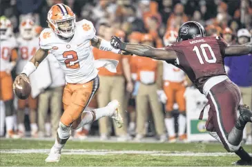  ?? SEAN RAYFORD / AP ?? Clemson quarterbac­k Kelly Bryant saw limited action the past two seasons but now has blossomed into a dual-threat force, completing 66 percent of his passes for 2,426 yards and rushing for 639 yards and 10 TDs.