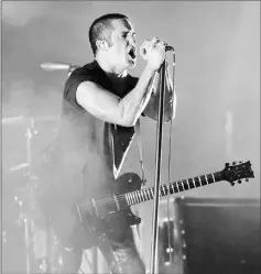  ??  ?? Reznor of Nine Inch Nails performs at a concert in New Orleans, Louisiana on Oct 29, 2005. — Reuters file photo