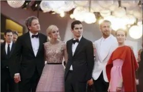  ?? KIRSTY WIGGLESWOR­TH — THE ASSOCIATED PRESS ?? Actors Jason Clarke, from left, Olivia Hamilton, director Damien Chazelle, actors Ryan Gosling and Claire Foy pose for photograph­ers upon arrival at the premiere of the film ‘First Man’ and the opening ceremony of the 75th edition of the Venice Film Festival in Venice, Italy, Wednesday, Aug. 29, 2018.