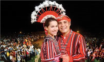  ??  ?? TRIBAL WEAR On top of a church wedding, newly elected senator Miguel and Audrey Zubiri were married in an authentic Manobo ceremony