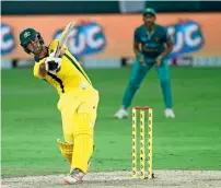  ?? Photo by M. Sajjad ?? Glenn Maxwell playing a shot during the second T20 match against Pakistan. —