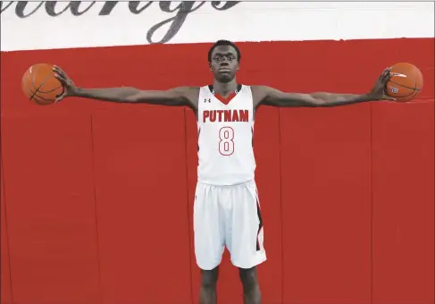  ?? Submitted photo ?? Akok Akok, a versatile 6-foot, 9-inch wing from Putnam Science Academy in Connecticu­t, is high on PC coach Ed Cooley’s 2019 recruiting wish list. The Friars are hoping Akok’s connection with Mass Rivals will pay off. Former Mass Rivals players David Duke, A.J. Reeves and Makai Ashton-Langford play at PC.