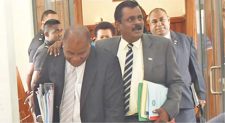  ?? Photo: Vilimoni Vaganalau ?? Opposition MP Niko Nawaikula (left), with Minister for Local Government, Housing and Environmen­t, Infrastruc­ture and Transport Parveen Kumar outside Parliament yesterday.