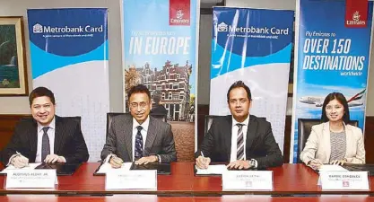  ??  ?? Emirates and Metrobank recently forged a partnershi­p that gives Metrobank cardholder­s discounts on Emirates flights to Europe. In the photo are (from left) Metrobank Prepaid Card Business head Aloysius Alday, Metrobank president Pradeep Pant, Emirates...