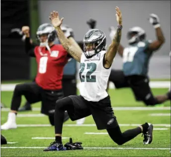  ?? MATT ROURKE — THE ASSOCIATED PRESS ?? Eagles cornerback Sidney Jones, stretching during a practice session Dec. 14, has been activated and is set to make his debut Sunday in the Eagles’ regular-season finale against Dallas.