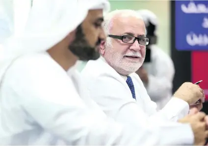  ?? Photos Delores Johnson / The National ?? Ahmed Al Hajeri, left, deputy chief executive of National Ambulance, and Prof Qutayba Hamid, vice chancellor of medical and health sciences at the University of Sharjah, said demand for paramedics was growing.