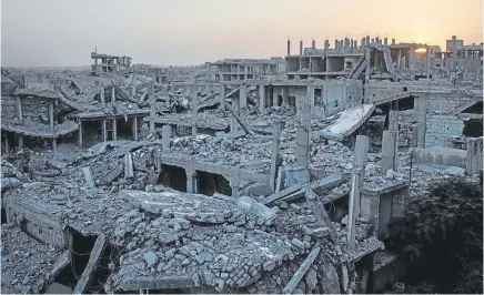  ?? Photo: WASHINGTON POST ?? The rebuilding has started in Kobane but it is going to be a long and expensive job, say locals.