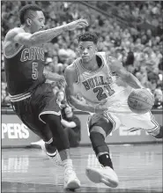  ?? AP/NAM Y. HUH ?? Guard Jimmy Butler (right) will be reunited with former coach Tom Thibodeau after Chicago traded him to Minnesota for guards Zach LaVine and Kris Dunn on Thursday. The Bulls also received Lauri Markkanen, who was drafted No. 7 overall, while the Wolves...