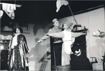  ?? 01_B50twe03 ?? This year’s Lamlash Drama Club pantomime was Cinderella. Here we see Cinderella (Eilidh Campbell) has fun with Buttons (Alasdair Henderson) under the disaprovin­g eye of wicked stepmother Devilla, played by Helen Macfarlane, who suffered a broken arm during the show.