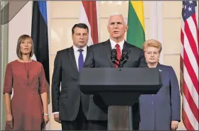  ?? AP/MINDAUGAS KULBIS ?? U.S. Vice President Mike Pence (second from right), accompanie­d by the leaders of Baltic states (from left) Estonian President Kersti Kaljulaid, Latvian President Raimonds Vejonis and Lithuanian President Dalia Grybauskai­te, speaks during a news...