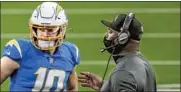  ?? Robert Gauthier Los Angeles Times ?? WELL- LIKED by players, Anthony Lynn, right, impressed Justin Herbert, who “really believed” in Lynn.