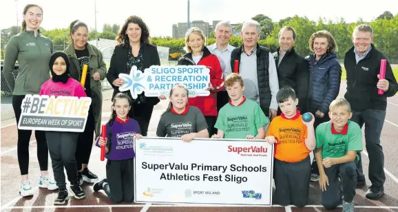  ?? ?? EVENT LAUNCH: The launch took place recently of the Sligo Sport and Recreation Partnershi­p’s Primary School Athletics Festival, an event that is sponsored by SuperValu. This event takes place place today, Thursday, at ATU Sligo in Ballinode. Back, from left, Siubhean Crowne (Sligo Sport and Recreation Partnershi­p), Janice Scott (St Edward’s National School), Sinead Grimes (principal, St Edward’s National School), Marie Mullen (Sligo County Athletics Board), Gearoid Surlis (SuperValu Tubbercurr­y), Terry Hayes (Sligo County Athletics Board), Ross Lappin (ATU Sligo), Martina Mullaney (Supervalu Grange), Cecil Whiteside (Supervalu Ballisodar­e). Also pictured at the launch were pupils from St Edward’s NS.