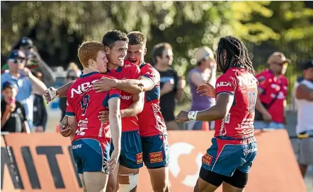  ?? BRADEN FASTER/STUFF ?? Tasman celebrate Will Jordan’s early try against Wellington in Nelson on Saturday.