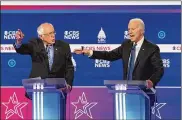  ?? ERIN SCHAFF / THE NEW YORK TIMES ?? With former Vice President Joe Biden (right) and Sen. Bernie Sanders (I-Vt.) going toe to toe in Charleston, S.C., Tuesday’s debate was likely the last chance for some candidates to save themselves and alter the trajectory of the nomination fight.