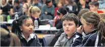  ??  ?? Thinking . . . Qt Joseph’s Ashsurton pupils (from left) Qophia Aguila (11), Brendan McCrea (10) and Nhoese McKenzie (10) ponder a question.