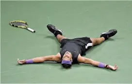  ??  ?? Rafael Nadal reacts after beating Daniil Medvedev in the US Open final at Flushing Meadows in New York on Sunday. — Reuters