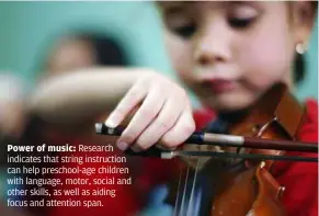  ??  ?? Power of music: research indicates that string instructio­n can help preschool-age children with language, motor, social and other skills, as well as aiding focus and attention span.