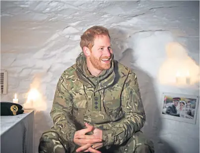  ??  ?? COLD COMFORT: The Duke of Sussex in the Quincey Shelter, a makeshift shelter built of snow, in Bardufoss