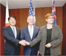  ?? — Reuters ?? Japan’s Defence Minister Itsunori Onodera, US Secretary of Defence Jim Mattis and Australia’s Defence Minister Marisa Payne meet for a trilateral meeting on the sidelines of the IISS Shangri-la Dialogue in Singapore on Thursday.