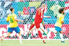  ??  ?? Belgium’s midfielder Kevin De Bruyne (C) scores his team’s second goal during the Russia 2018 World Cup quarter-final football match between Brazil and Belgium at the Kazan Arena in Kazan on July 6, 2018. — AFP Photo