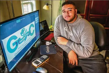  ?? STEVE SCHAEFER FOR THE AJC ?? Earl McLendon, 18, battled problems posed by medical issues that prevented him from keeping up with his classes at Discovery High, but he found success at Gwinnett Online Campus and earned a diploma from the Graduate Gwinnett program.