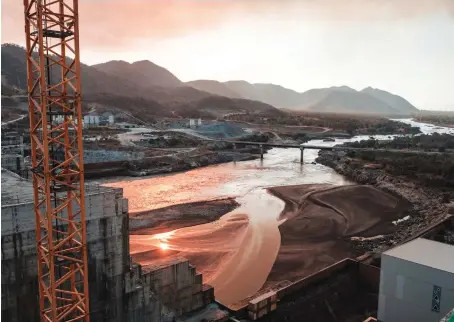  ?? AFP ?? The Blue Nile River passes through the Grand Renaissanc­e Dam – at the core of a dispute between Egypt, Ethiopia and Sudan – near Guba in Ethiopia.