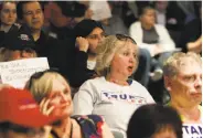  ?? Matthew Dae Smith / Lansing (Mich.) State Journal ?? Darling Doetzel reacts to a pro-sanctuary city supporter’s comments at a meeting in Lansing.