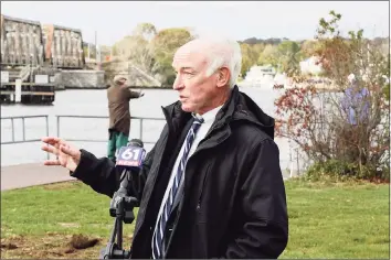  ?? Cat Salazar Digital Press Secretary Joe Courtney / ?? U.S. Rep. Joe Courtney at the DEEP Marine Headquarte­rs at Ferry Landing State Park in Old Lyme with the Amtrak bridge in the background.