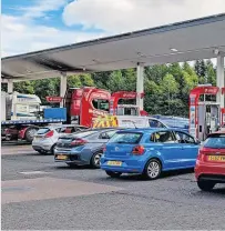  ?? ?? Running low Petrol stations have been busier than normal