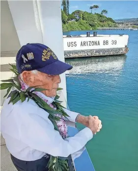  ?? PROVIDED BY RON MAHAFFEE ?? Pearl Harbor survivor Harry Chandler, 102, of Tequesta, leaves the 82nd Pearl Harbor Remembranc­e Day ceremony on Dec. 7 at Pearl Harbor in Honolulu, Hawaii.