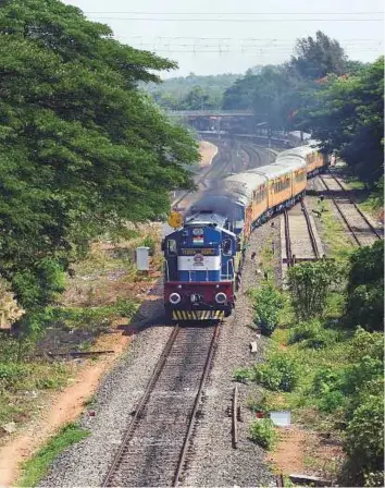  ?? AFP ?? The Tejas Express luxury train leaves for its first return journey between Goa and Mumbai at the Karmali railway station in Goa on Tuesday.