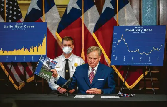  ?? Ricardo B. Brazziell / Austin American-Statesman via AP ?? Gov. Greg Abbott says COVID-19 “must be corralled” at a news conference Monday at the Texas Capitol. Hospitaliz­ations have more than doubled in recent weeks.