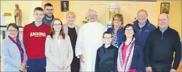  ?? (Pic: P O’Dwyer) ?? Fr Michael Corkery PP being congratula­ted on the occasion of his 70th birthday last Sunday morning in the Church of the Holy Family, Curraghaga­lla by parishione­rs Joan Roche; Jamie, Niall, Anne and Katie Fogarty, Mary and Jimmy Frewen; Leo O’Driscoll, and Catherine and Tony Sheehan.