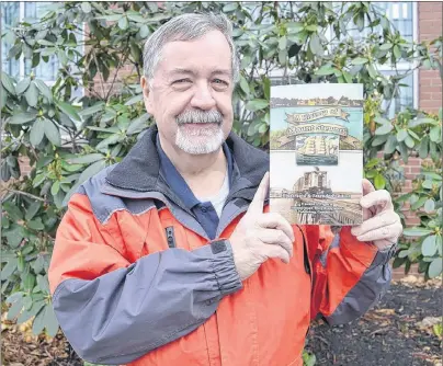  ?? MAUREEN COULTER/THE GUARDIAN ?? Dan McAskill, president of The Hillsborou­gh River Associatio­n, holds a copy of the book, “A History of Mount Stewart: Illustrate­d & Extended Edition”. A book launch will be held at the Mount Stewart Community Centre on Nov. 19.