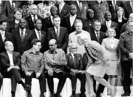  ?? REUTERS ?? IMF Managing Director Christine Lagarde arrives for a group photo with Central Bank governors and finance ministers at the Internatio­nal Monetary Fund-World Bank Group Annual Meeting 2018 in Nusa Dua, Indonesia