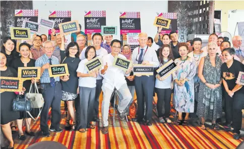  ??  ?? Abdul Karim (centre) together with WAK 2017 sponsors and content drivers at the launch of ‘JOY - Photograph­s & Haiku’ exhibition.