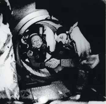  ?? ?? NICE TO MEET YOU: Soviet Commander Alexei Leonov, left, and Thomas Stafford became close friends.