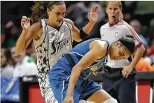  ?? Kin Man Hui / Staff photograph­er ?? Becky Hammon, left, and Lindsey Harding have gone from the courts of the WNBA to jobs in the NBA.