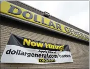  ?? MICHAEL CONROY — THE ASSOCIATED PRESS ?? A help-wanted sign is displayed at the Dollar General store in Cicero, Ind., on Sept. 2, 2020.