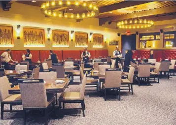  ?? JIM THOMPSON/JOURNAL ?? Staff members prepare for the dinner hour at the Juniper Steakhouse, a new business at the Santa Ana Star Casino and Hotel.