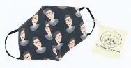  ?? (REFINED RACCOON TEXTILES VIA AP) ?? This product image released by Refined Raccoon Textiles shows a 100% cotton face mask featuring a repeating design of the late Supreme Court justice Ruth Bader Ginsburg’s head against a black background. Ten percent of each purchase will be donated to the American Cancer Society in Ginsburg’s honor.