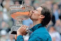  ?? AP - Petr David Josek, file ?? Rafael Nadal can tie Roger Federer’s mark of 20 career Grand Slam titles by winning the French Open, an event he has won 12 times.