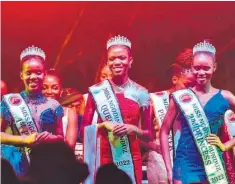  ?? ?? Miss Ngodini 2022 top three, Aphiwe Ntombela (1st princess), Simzuzile Danisa (winner) and Sisanda Mkhize (2nd princess) are all smiles with their crowns on