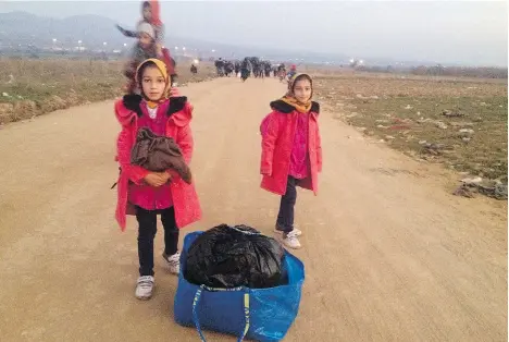  ?? DEBRA KELLNER ?? The documentar­y Inside My Heart, directed by Debra Kellner and produced by Frank Giustra, aims to humanize refugees by following four families for two-and-a-half years as they try to find their way to safety. Above, nine-year-old twins Saghara and Sahar travel to Europe on foot.