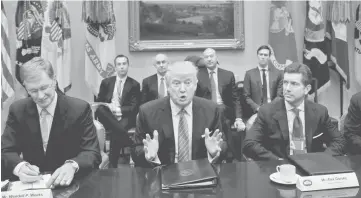  ??  ?? Trump hosts a meeting with business leaders in the Roosevelt Room of the White House in Washington. — Reuters photo