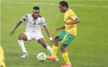  ?? /Gallo Images ?? Percy Tau during the Fifa World Cup qualifier against Ghana. Fifa is yet to rule on whether the match will be replayed following claims that the referee awarded Ghana a dodgy penalty.